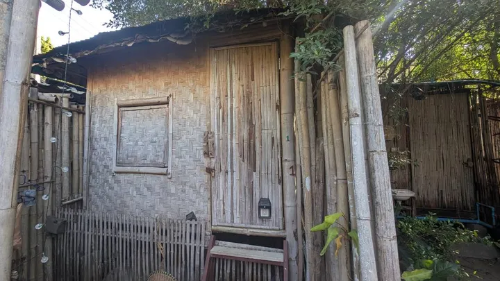 The outside of a bamboo hut
