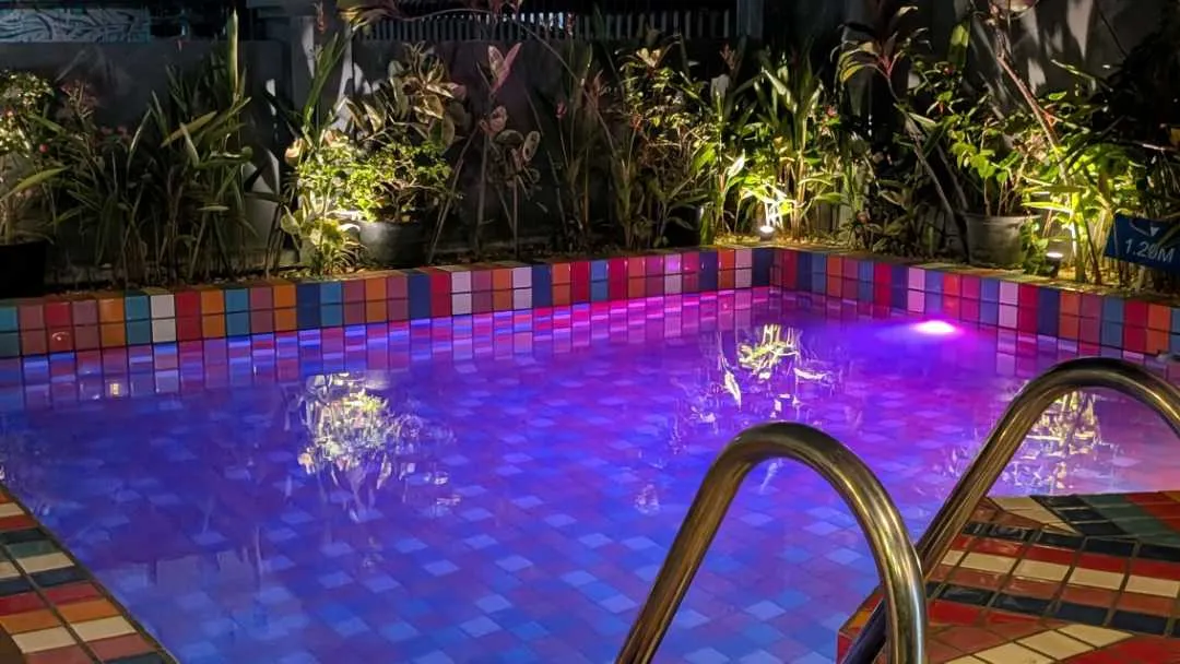 A small swimming pool at night