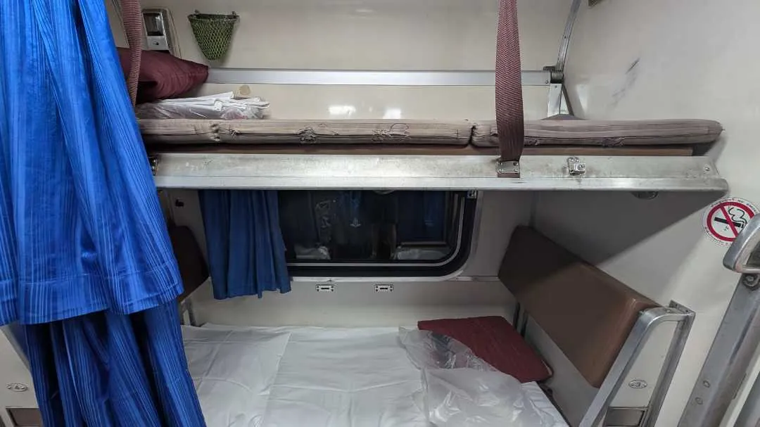 Seats converted to beds on a sleeper train