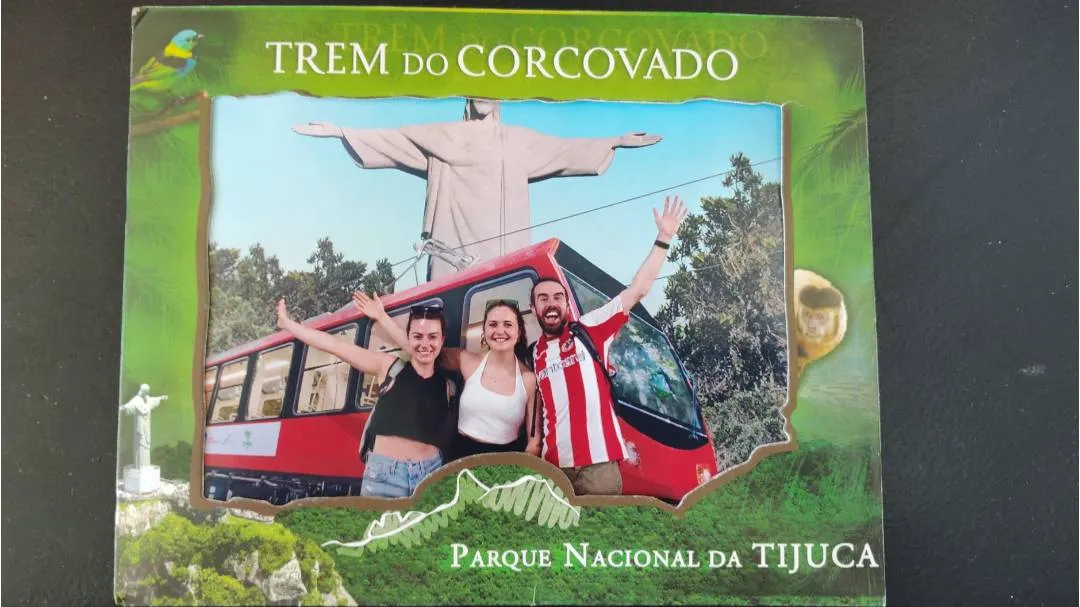 3 people posing for a pic at the Christ the Redeemer statue