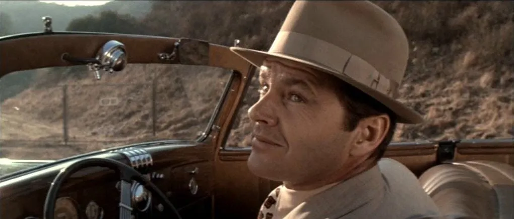 Jack Nicholson in a car from the film Chinatown