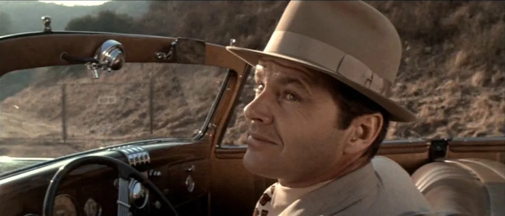 Jack Nicholson in a car from the film Chinatown