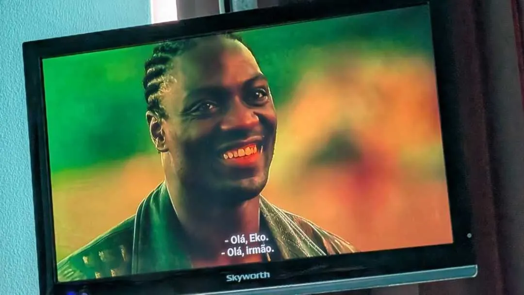 A TV showing the Mr Eko character from Lost