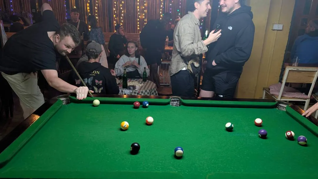 An irishman playing pool