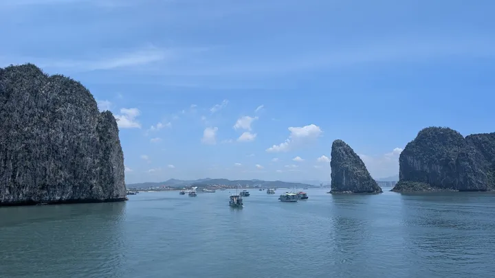 Ha Long Bay with the sea and some cruise ships between some islands