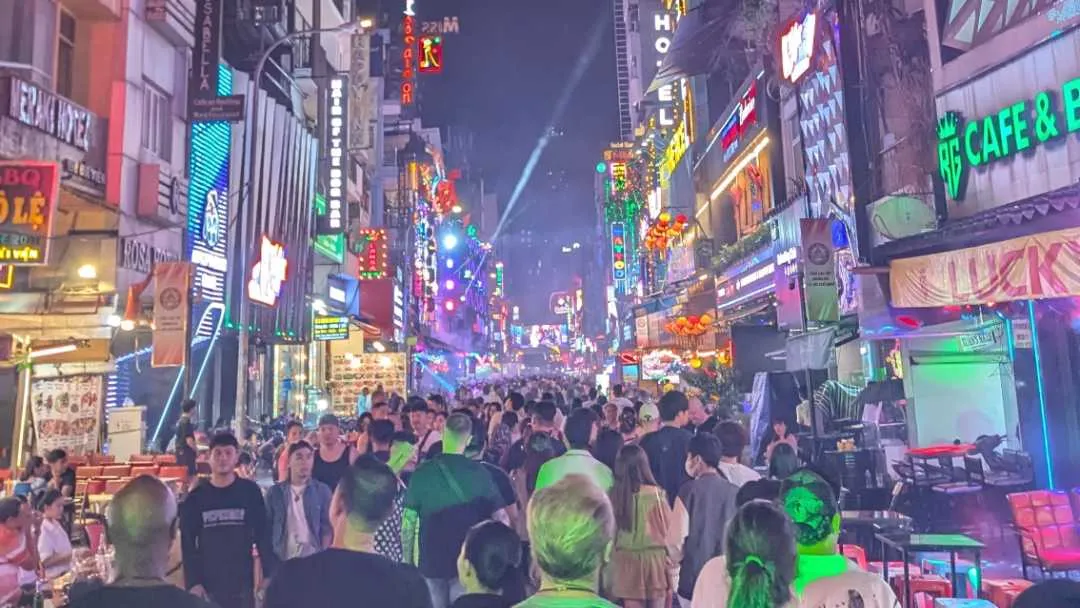 Busy Bui Vien street in Ho Chi Minh City at night