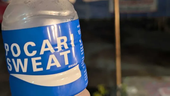 A close up of a bottle of Pocari Sweat