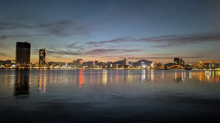 A night cityscape overlooking the Han river in Da Nang