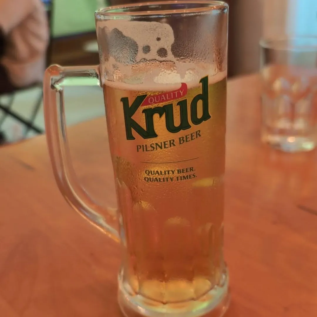 A close up picture of a glass of Krud beer