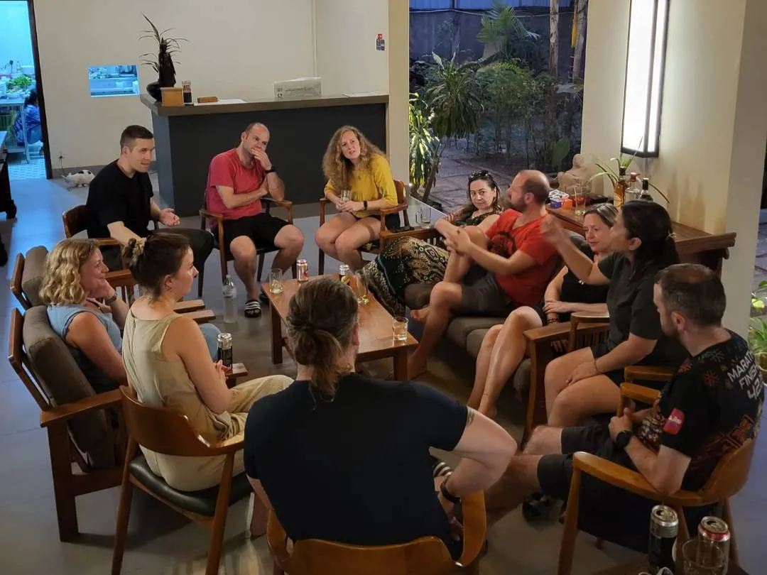 A photo taken of a group of people engaging in a round table discussion