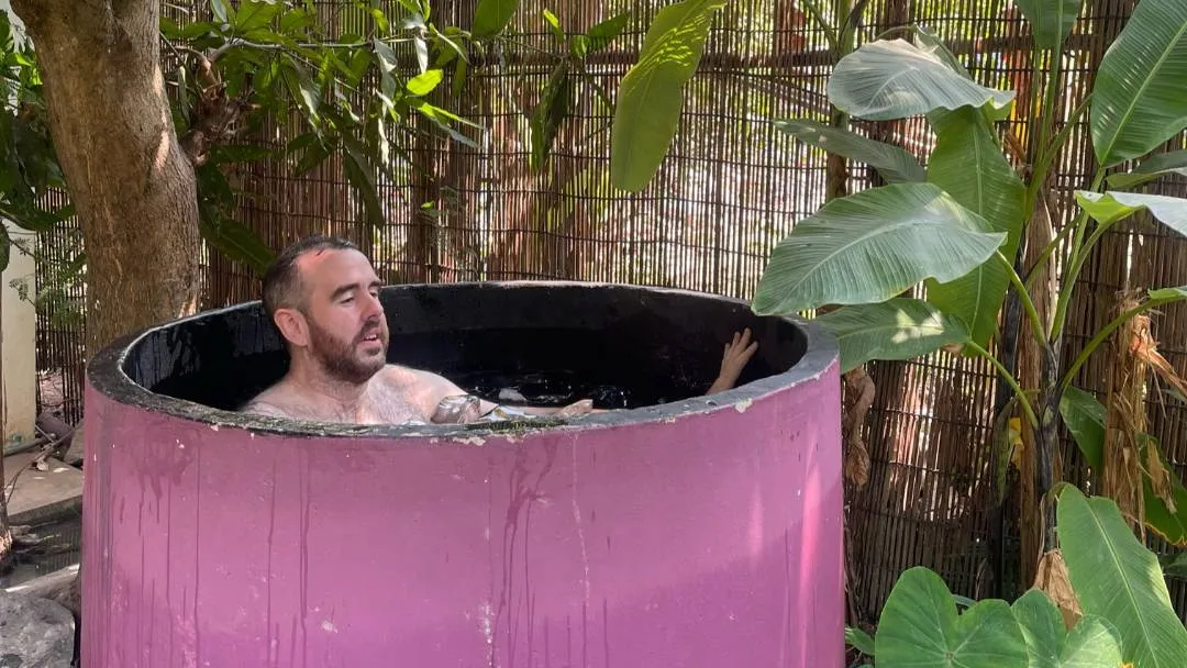 A pasty Irish man struggles in an ice bath