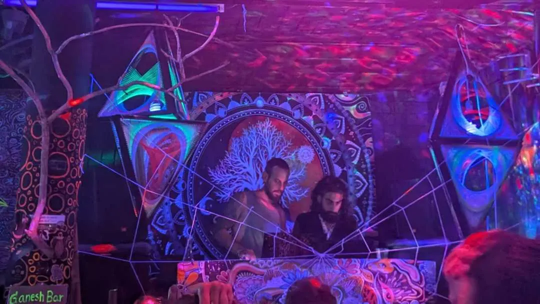 A psytrance gig with colourful props