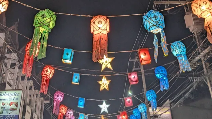 Night market in Thailand with colourful bunting on display