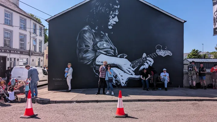 A mural of the guitarist Rory Gallagher in Ballyshannon on a sunny day