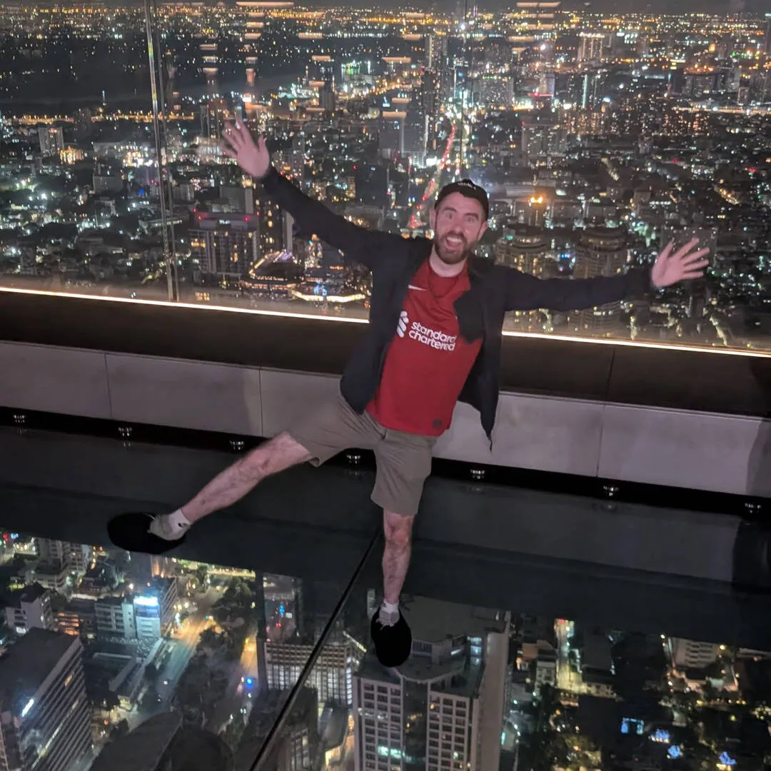 A pic on a Skywalk, with Bangkok skyline behind and below me