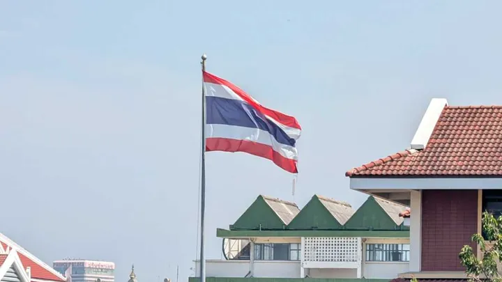 A Thailand flag blowing in the wind