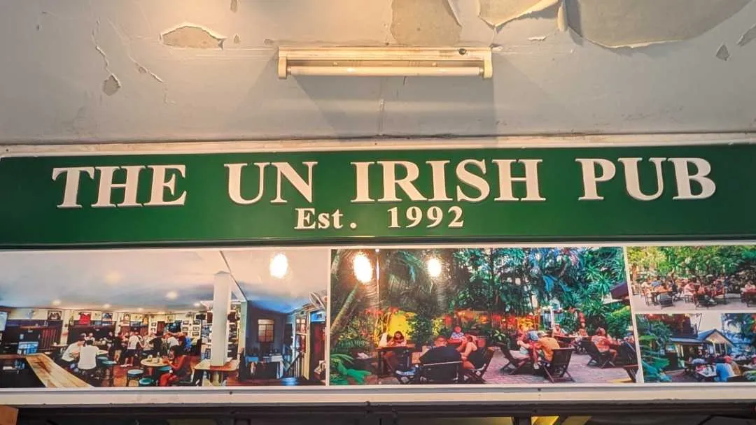 The outside of the pub named the UN Irish Pub