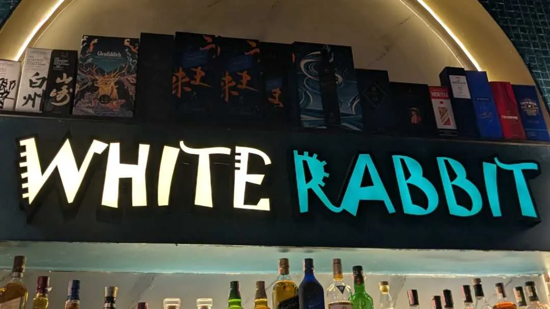 A signing displaying the words White Rabbit, the name of the pub